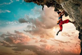 Fotográfia Athletic Woman climbing on overhanging cliff, Solovyova