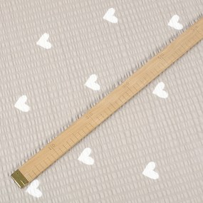 Goldea pamut krepp anyag - szívecskék, latté színű alapon 160 cm