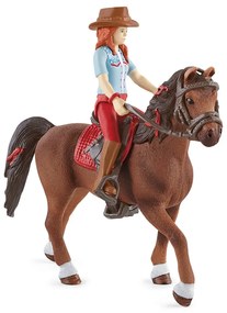 Schleich 42539 Vörös hajú Hannah mozgatható végtagokkal lovon, 15 cm