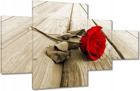 Vászonkép 130x80 Vörös rózsa a deszkákon