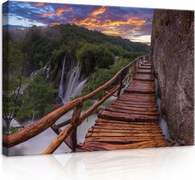 Vászonkép 70x50 Fa híd vízesés szakadék szikla köd hajnal természet