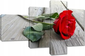 Vászonkép 100x70 Vörös rózsa a deszkákon