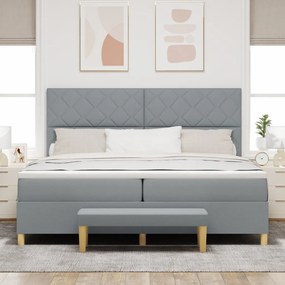 Boxspring ágy matraccal és paddal világosszürke 200x200 cm szövet