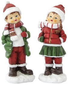 Gyerekpár téli ruhában karácsonyi dekoráció