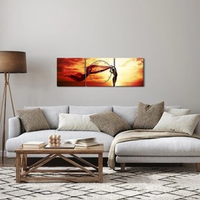 Kép - egy nő sziluettje a naplementében (órával) (90x30 cm)